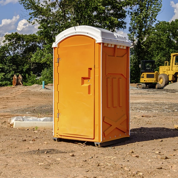 how often are the porta potties cleaned and serviced during a rental period in Raymond